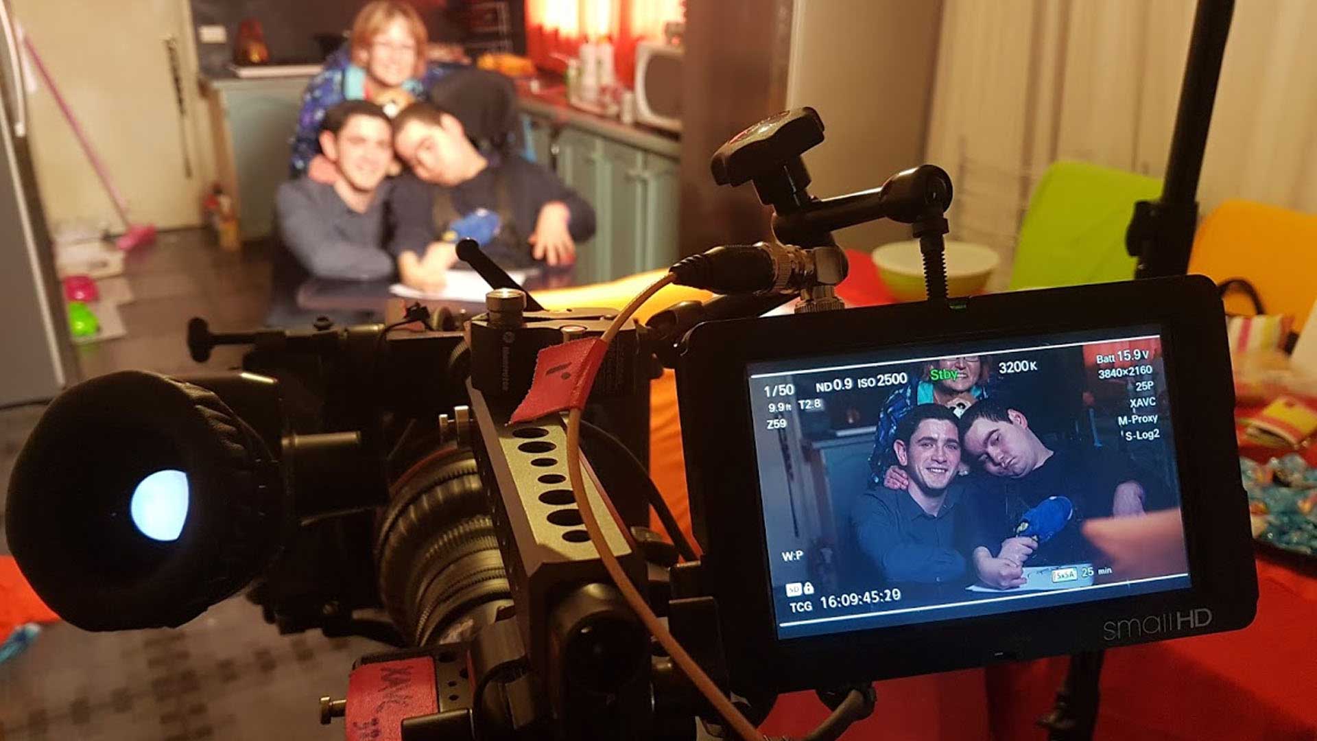 Photo of camera crew filming Michael, David and Vicky Casha